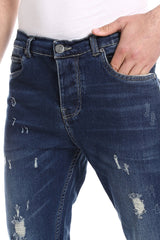 الجينز-بنطلون جينز كاجوال متسخ من قماش الدنيم باللون الأزرق