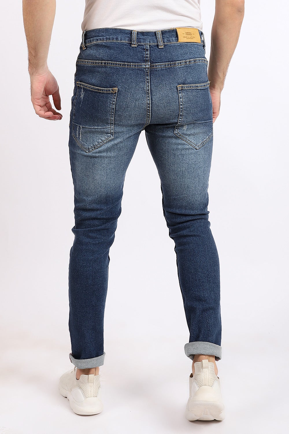 بنطال جينز قطني بقصة ضيقة به خدوش - أزرق فاتح قياسي